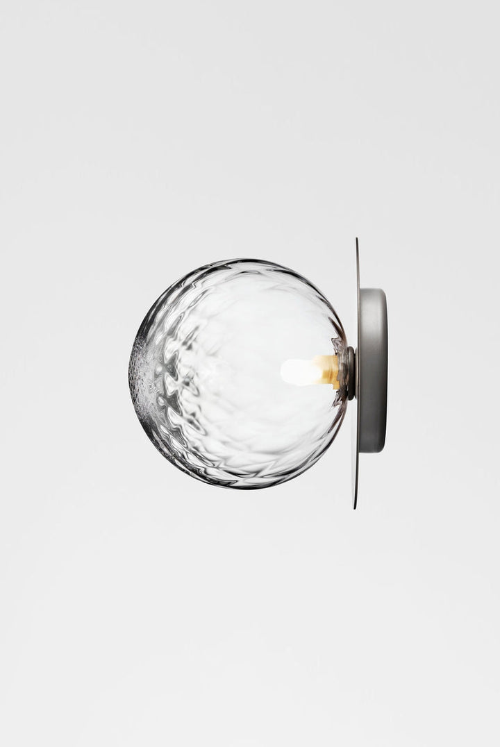 Nuura-Liila-1-vegglampetaklampe-large-light-silveroptic-glass-Vegglamper-Nuura-Nua_2046007-3.jpg